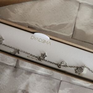 Dyadema- Sterling Silver Star & Moon Charm Bracelet - Silver